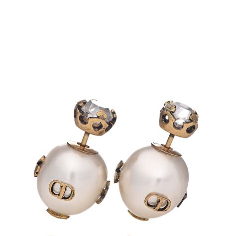 dior tribale earrings history.